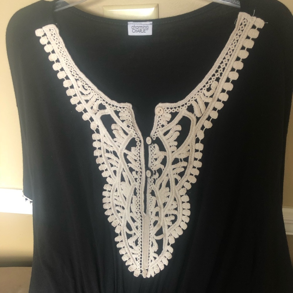 Adorable black with white crochet blouse